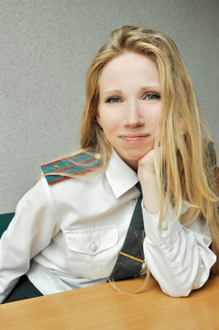 Blonde woman office portrait white shirt