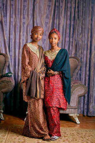 Couple traditional formal clothing studio portrait