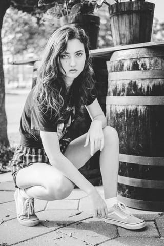 Woman black and white portrait wine barrel