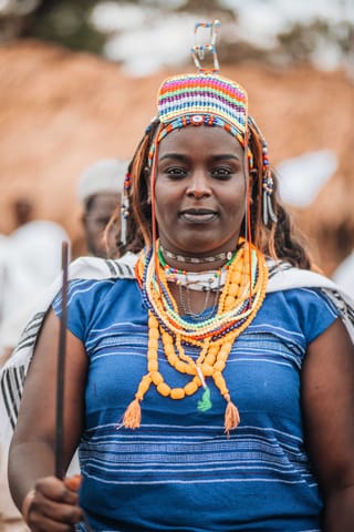Woman blue traditional dress beaded jewelry