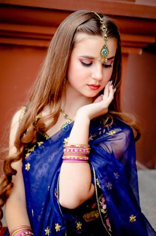 Woman blue traditional dress jewelry portrait