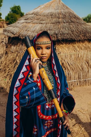 Woman colorful traditional dress village portrait