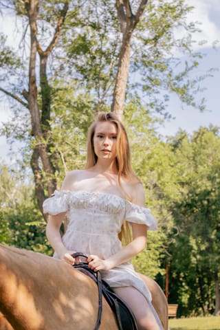 Woman horseback riding outdoor equestrian
