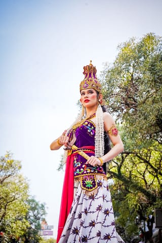 Woman traditional dancer ornate costume outdoor