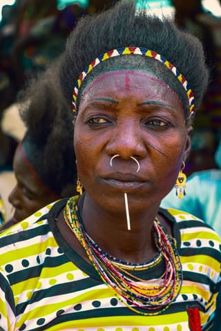 Woman colorful beads close up cultural portrait