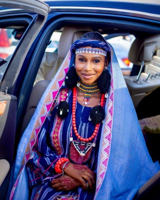 Woman colorful traditional dress car portrait