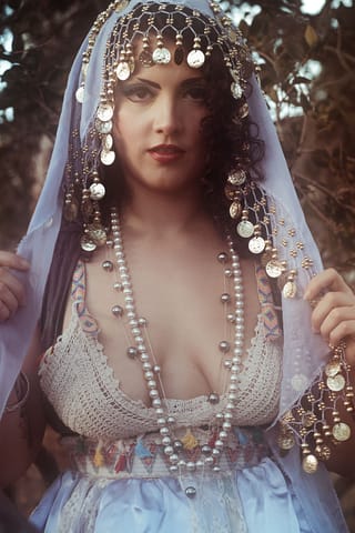 Woman white embellished dress veil portrait